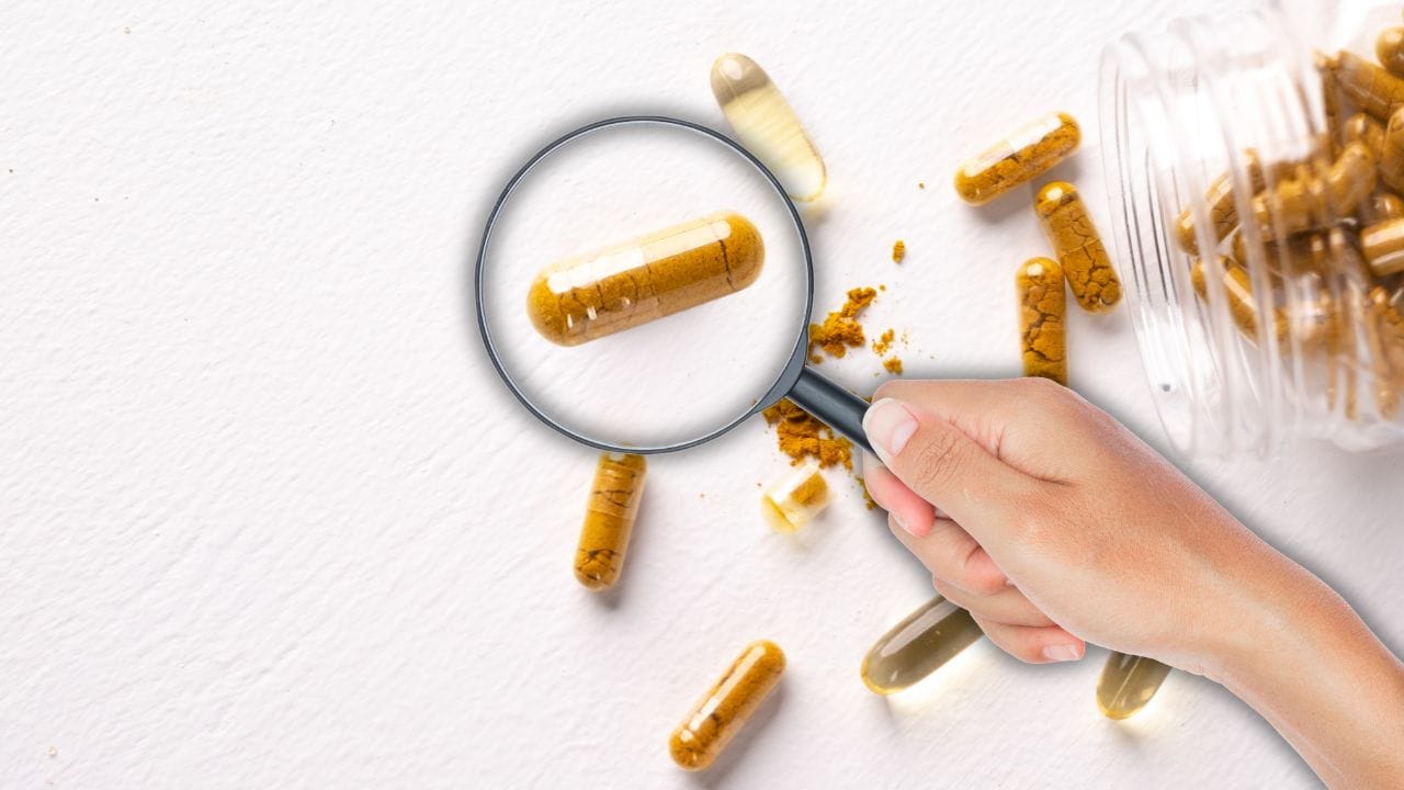 magnifying glass over supplements