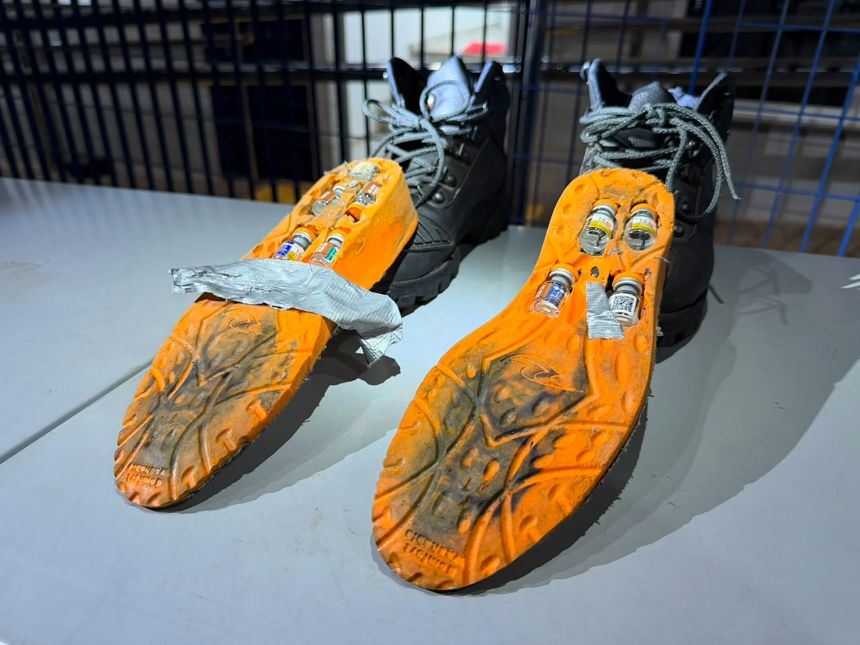 An image shows weight loss drugs being smuggled in a pair of shoes.