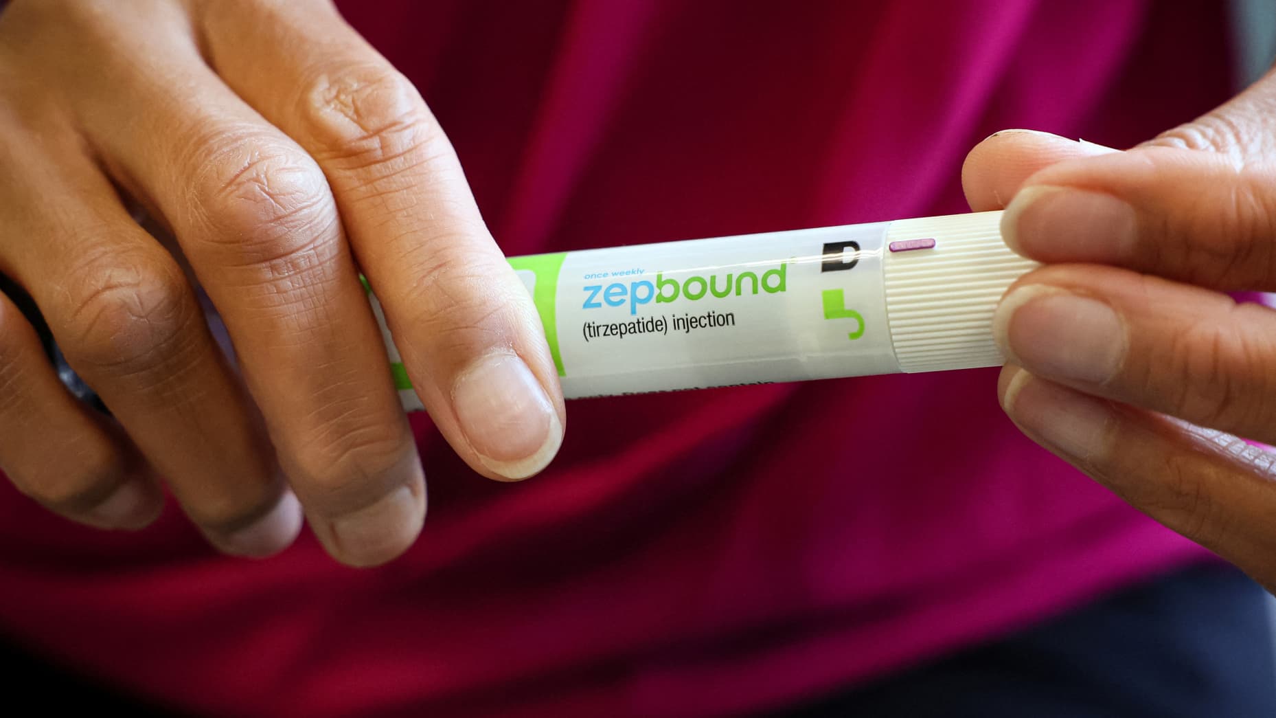 An injection pen of Zepbound, Eli Lilly’s weight loss drug, is displayed in New York City, U.S., December 11, 2023.  REUTERS/Brendan McDermid