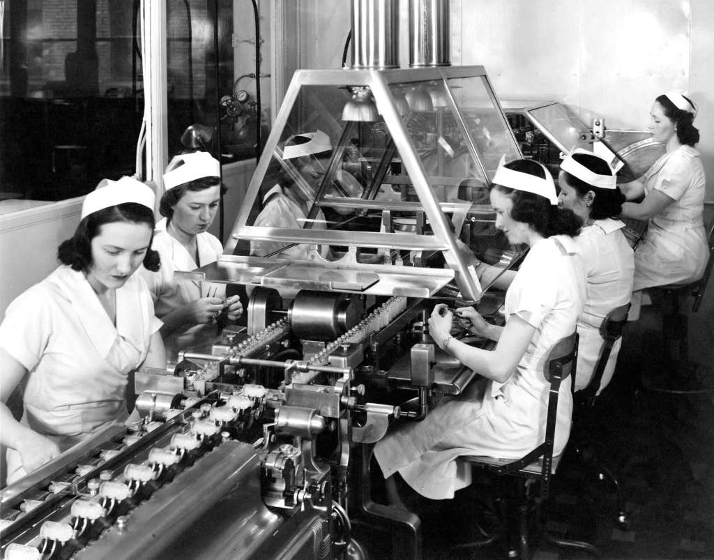 Lilly employees in the 1940s working on a penicillin manufacturing line