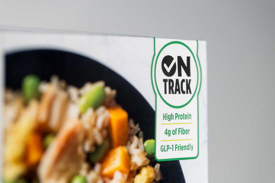 The label says "On Track: High Protein, 4g of Fiber, GLP-1 Friendly."
